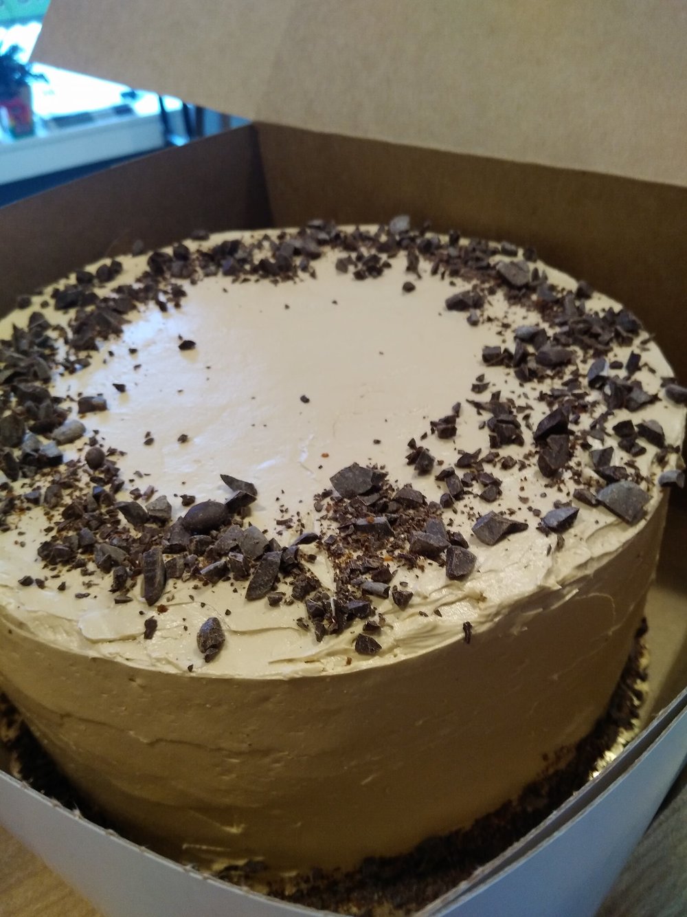 Two 9” layers of chocolate cake flavored with cinnamon and chili. Filled and frosted with coffee buttercream. Portland Maine
